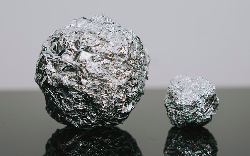 two balls made of aluminum foil
