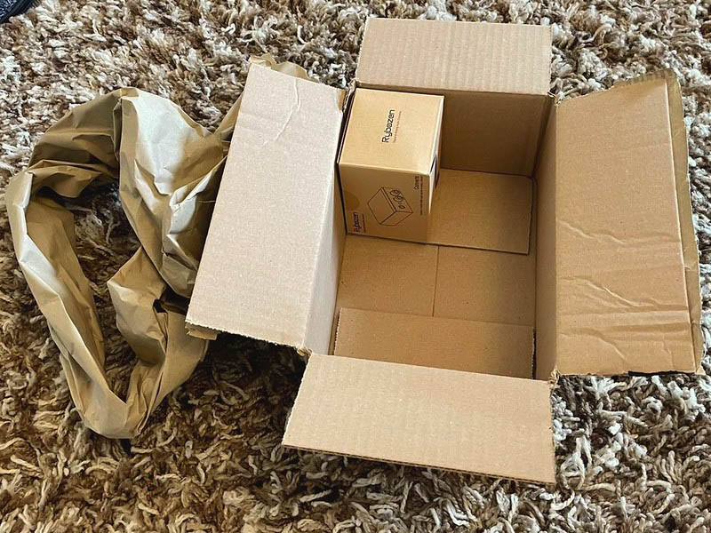 amazon cardboard and paper packaging on the floor