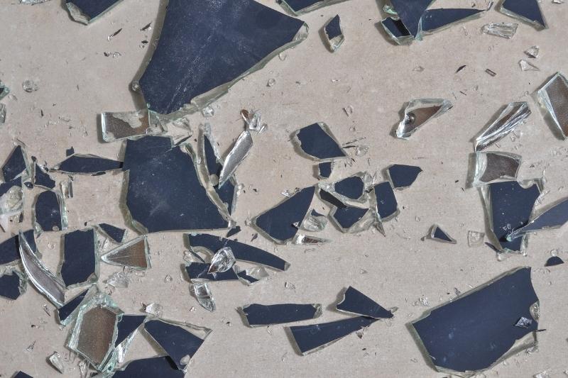 broken mirror glass on the floor