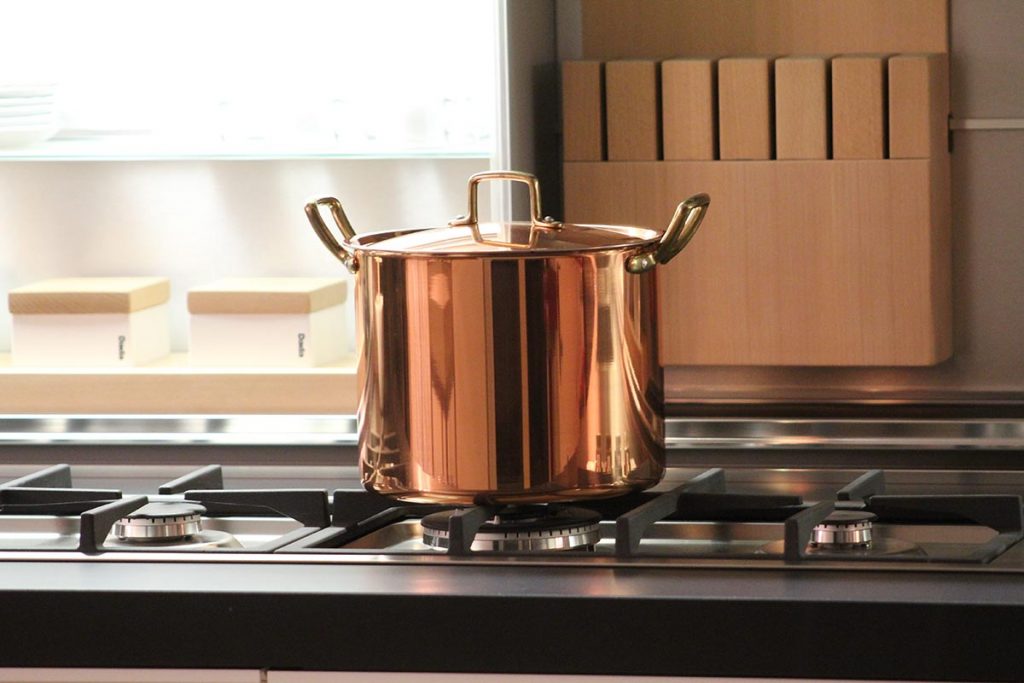 copper cooking pot on a stove
