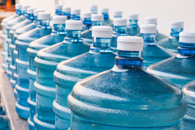 drinking water in large bottles