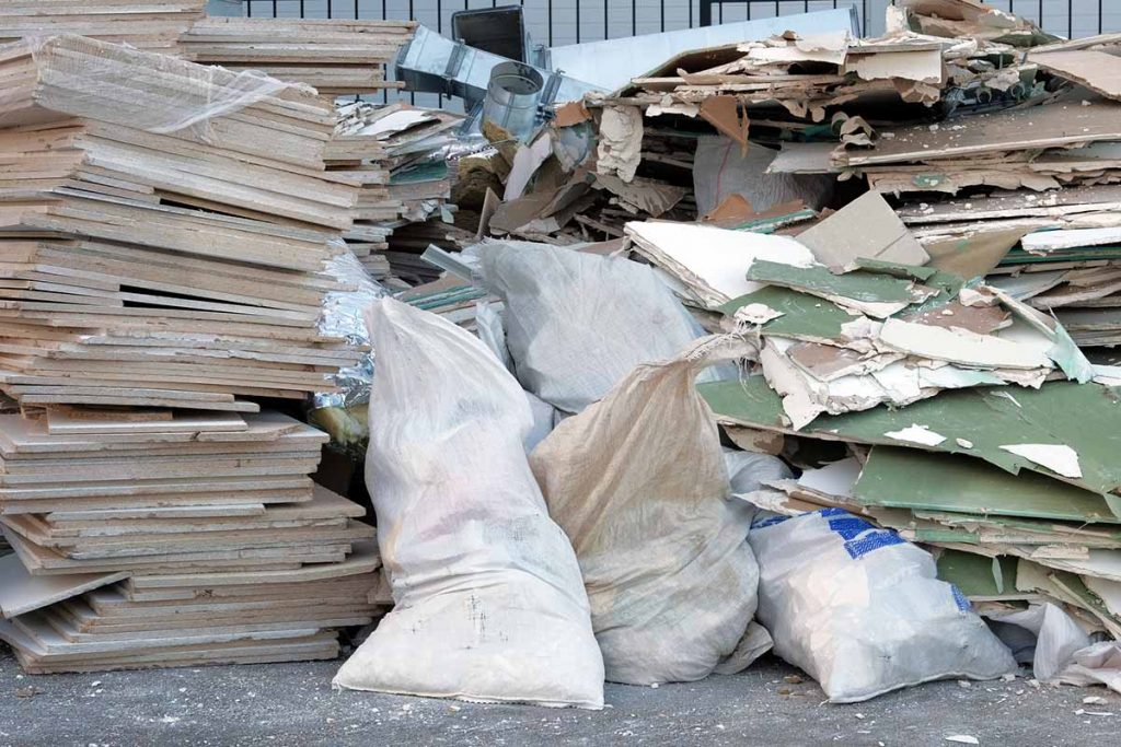 piles of drywall waste