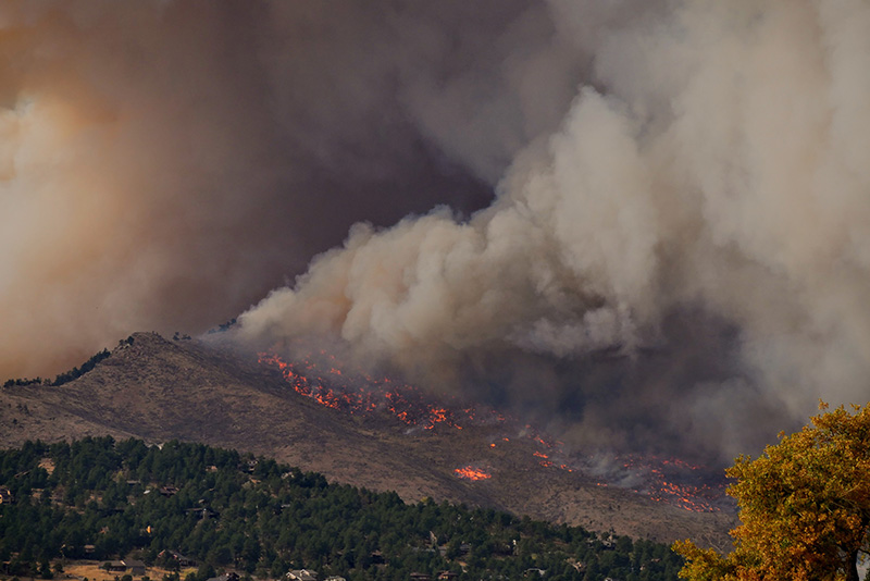 an aerial view of forest fire