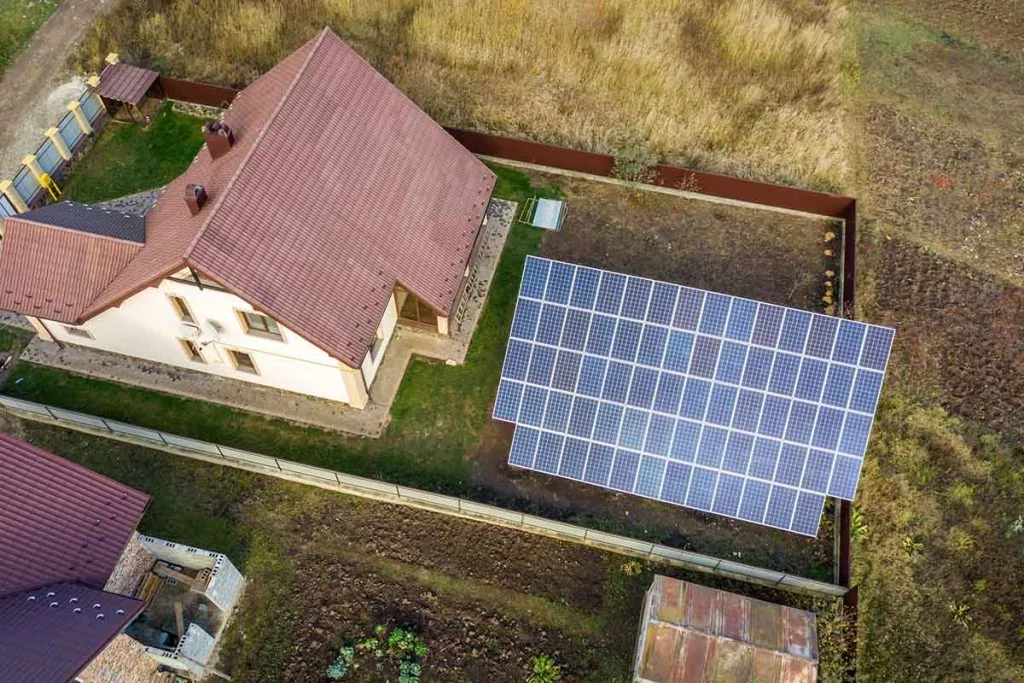 ground mounted solar panels installed near the house
