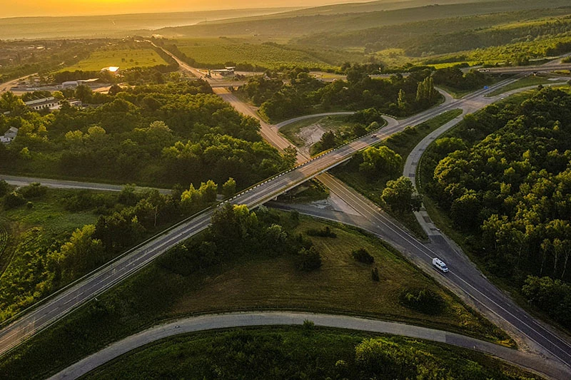 bird's eye view of the highway between cities