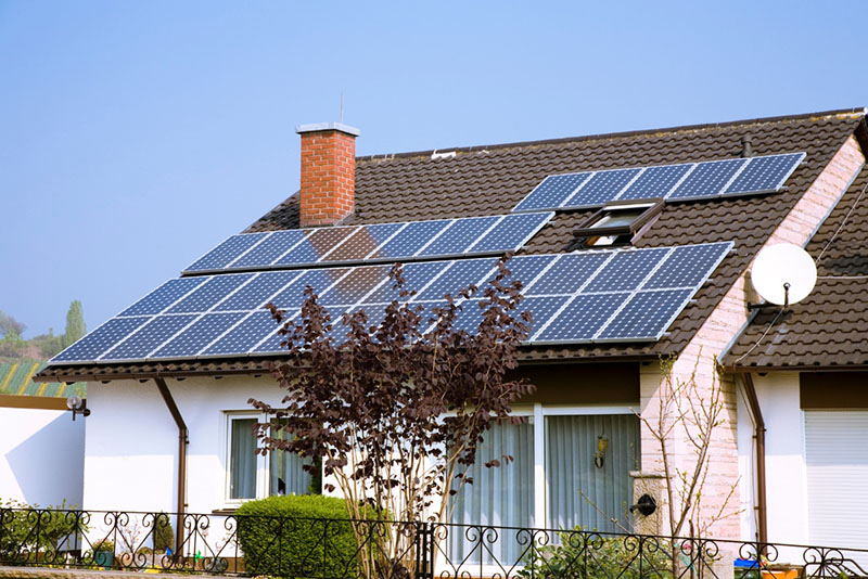 house with a rooftop solar system