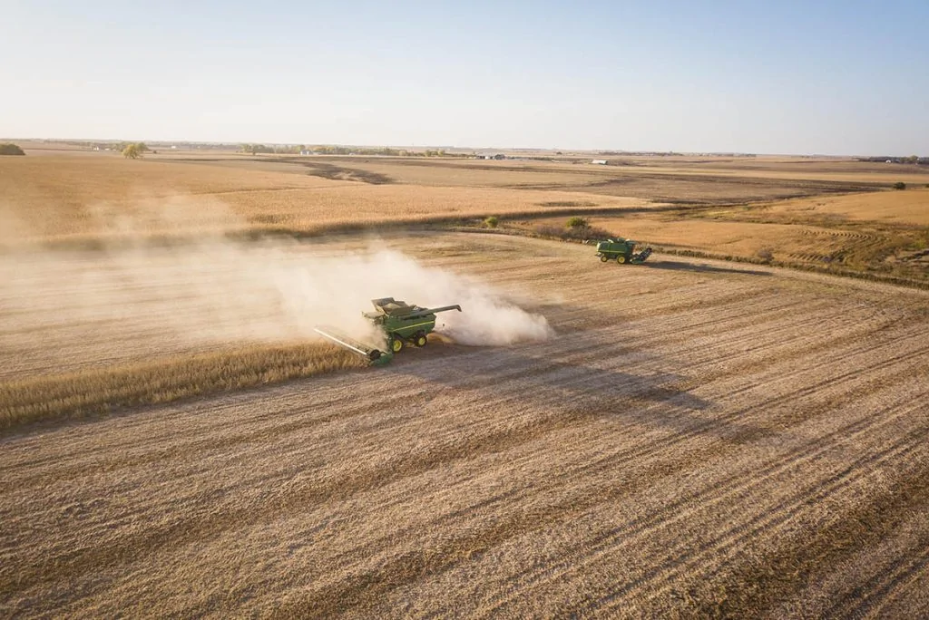 tractors working on an agricultural field