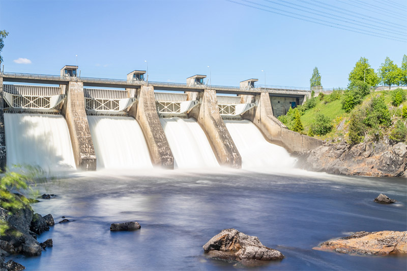 water moving through a hydroelectric power plant 