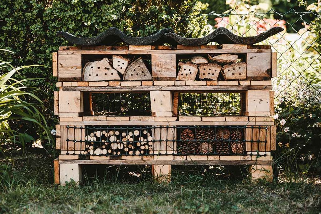 insects hotel made of recycled wood pallets