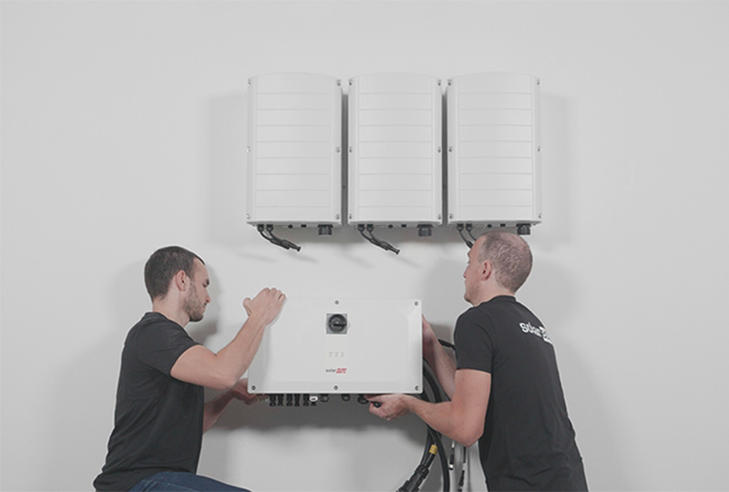 two man installing a SolarEdge system