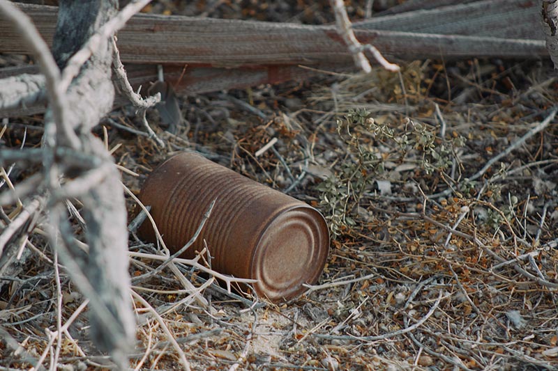 old metal can on the ground