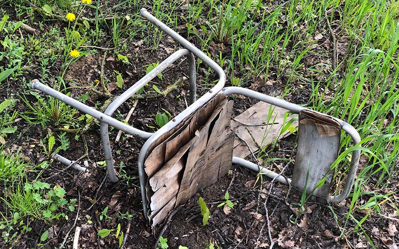 old metal chair on the ground