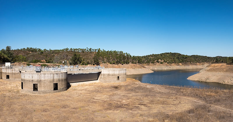 Exposed water intake of the Pego do Altar dam during a severe drought