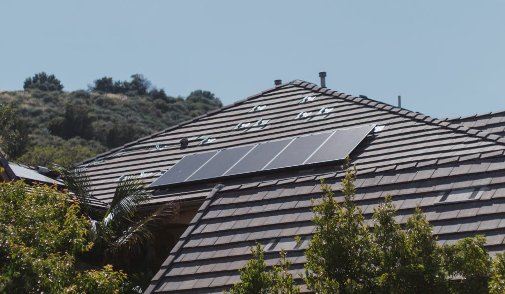 a solar panel on a house roof