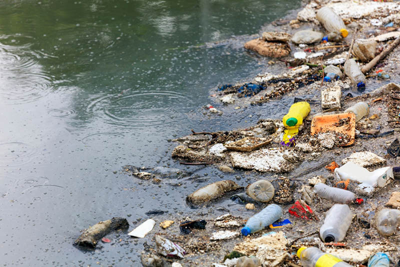 plastic waste near a body of water