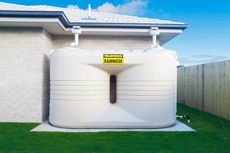 rainwater harvesting system in the house backyard