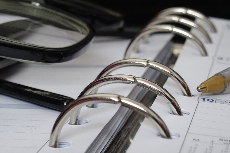 a close up of metal ring binder