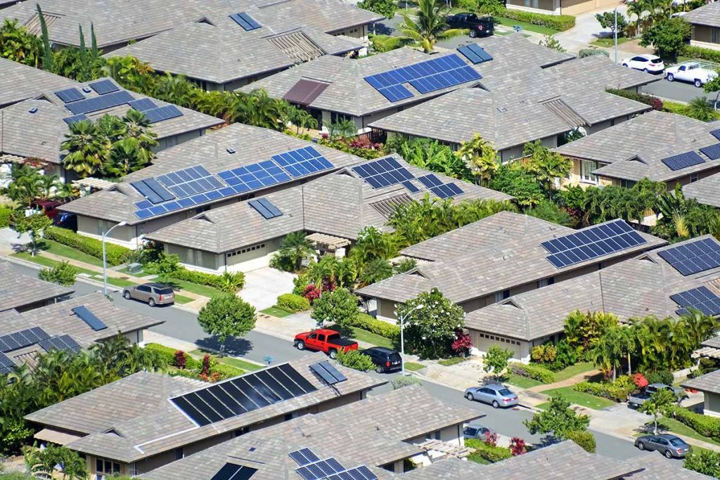 rooftop solar panel arrays in a residential area
