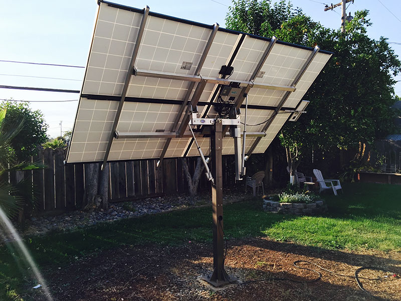 a solar tracker mounted on the back of the solar panel
