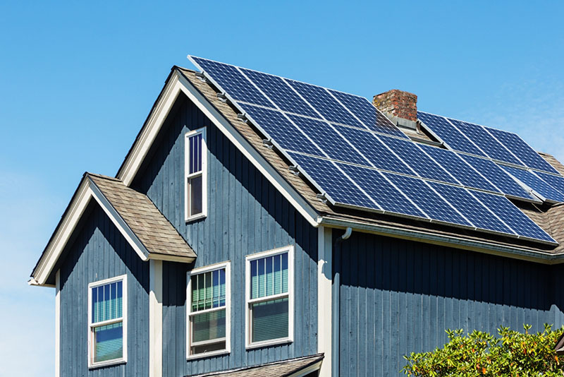 residential house with solar panels on a roof