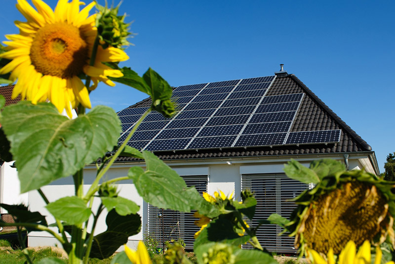 rooftop solar panels on a suburban house