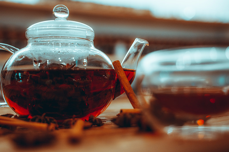 glass teapot with loose-leaf tea