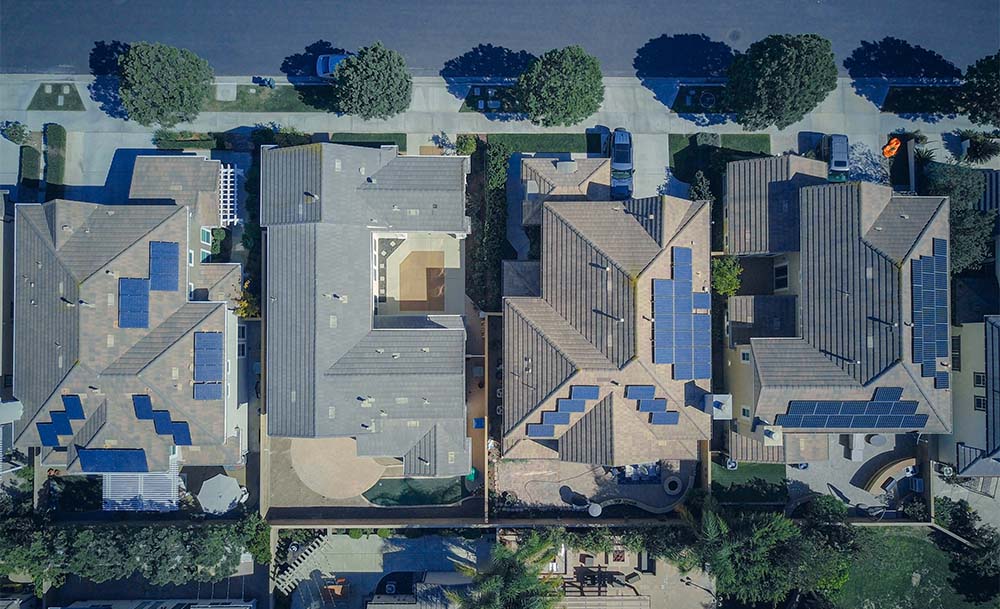 top view of houses with solar panels