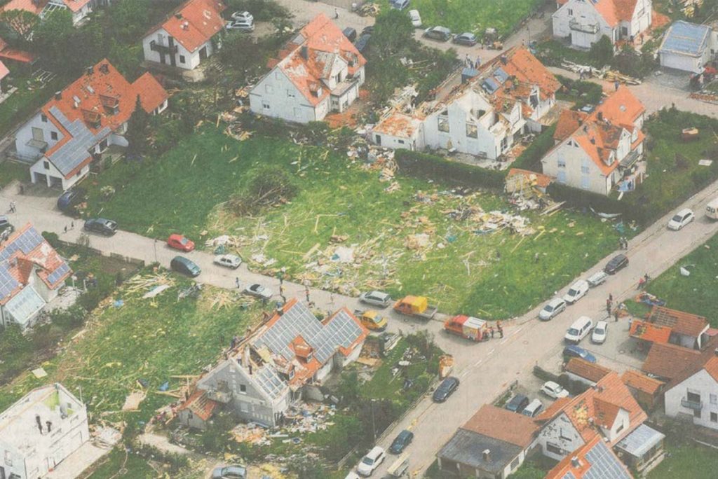 residential houses with rooftop solar panels damaged by tornado